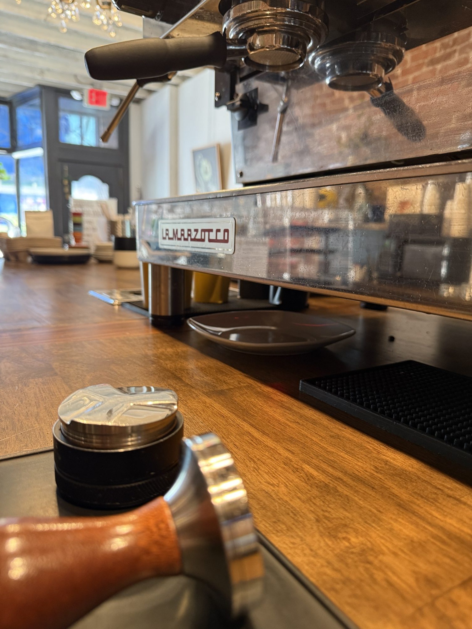 Espresso being prepared behind the bar